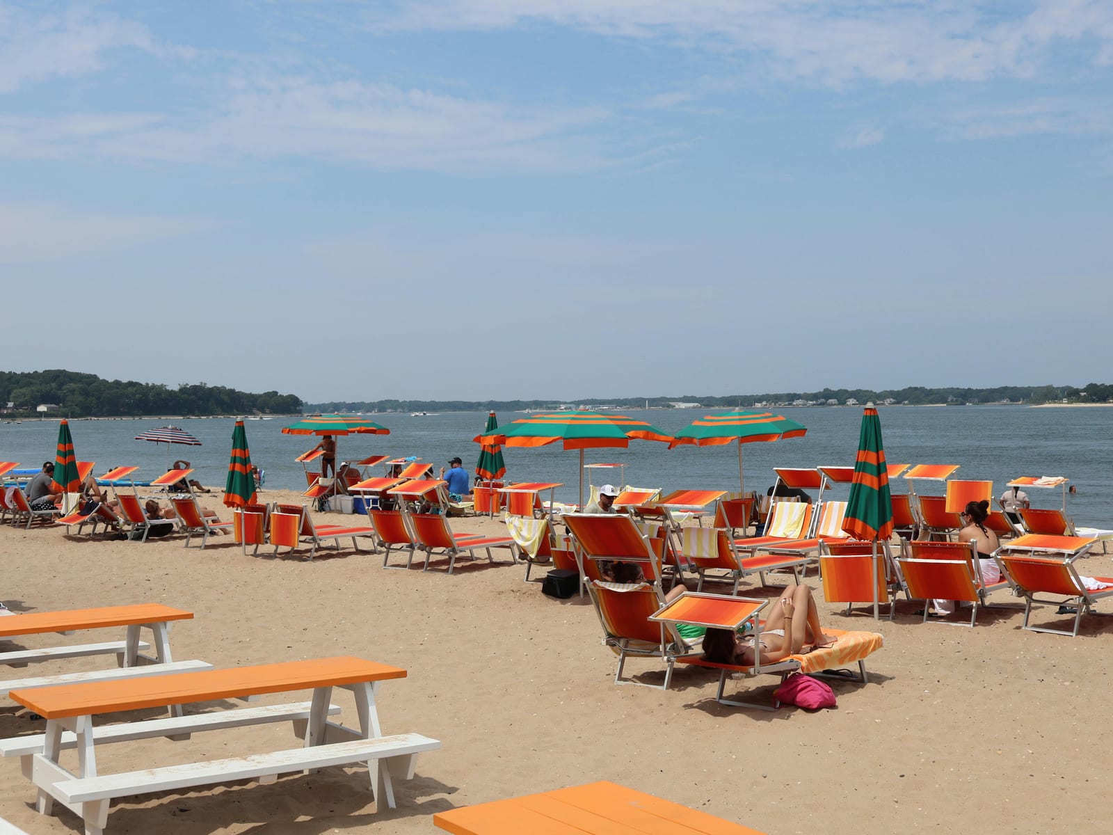 Orange beach chairs and umbrellas on Shelter Island waterfront